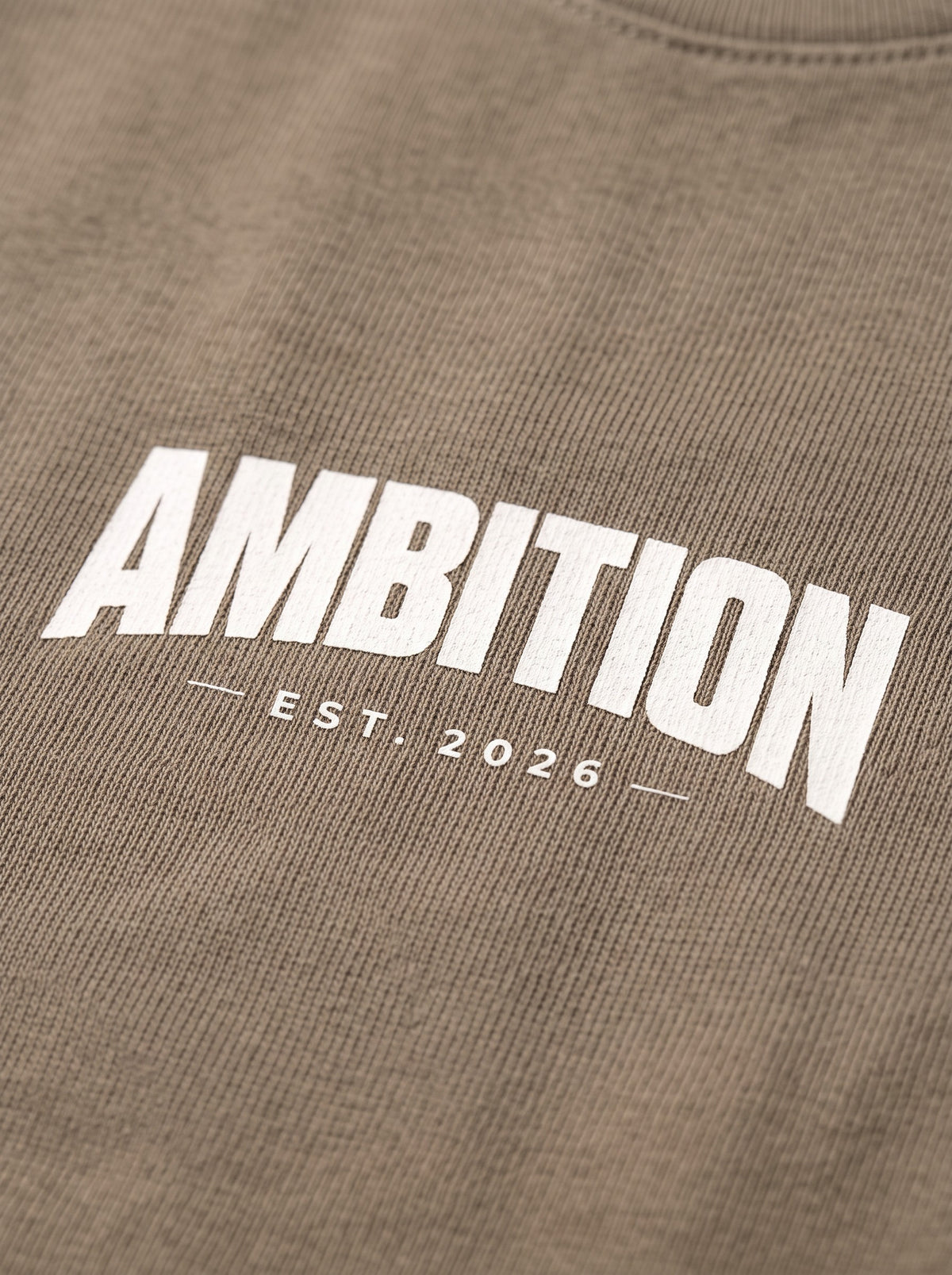 Ambition Limitless beige organic cotton oversized t-shirt with white printed logo detail
