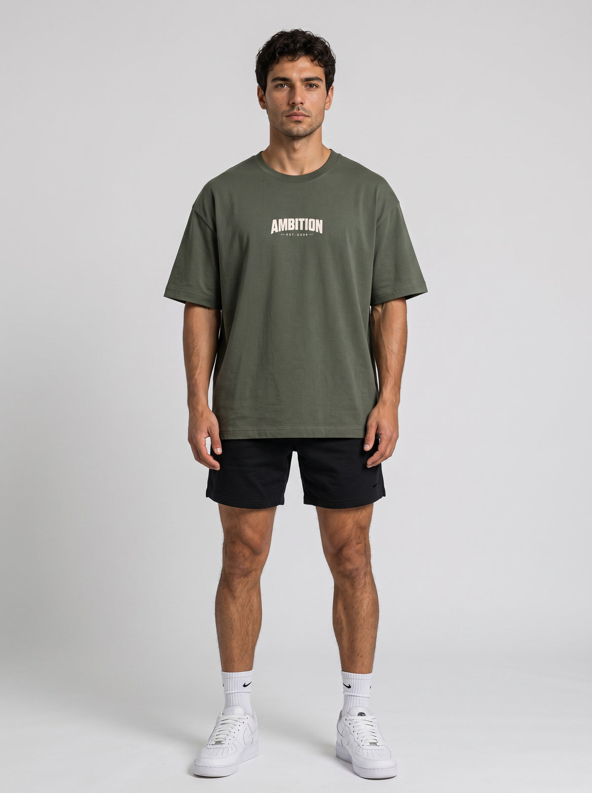 Ambition Limitless olive green organic cotton oversized t-shirt with dropped shoulders and white chest logo print